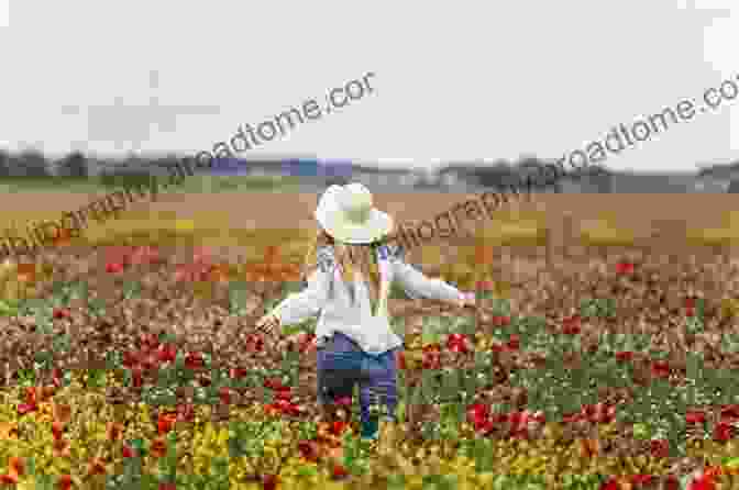 A Surreal Landscape With A Woman Walking Through A Field Of Flowers Dreams: A Counting Eve Heidi Bine Stock