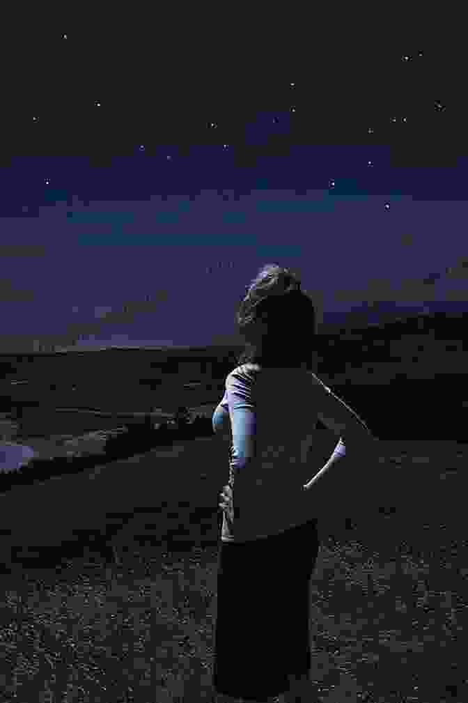 A Woman Standing In A Field, Looking Up At The Sky. Reckoning With Darkness (Passing Through Darkness 4)