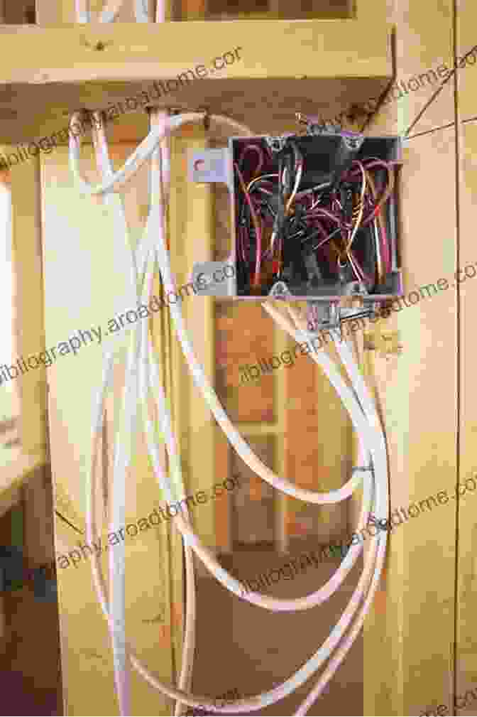 Electrical Cables Being Pulled Through A Wall During Rough In Wiring BASIC GUIDE TO ROUGH IN ELECTRICAL WIRING: Rough In Wiring Capability That All The Electrical Cables Have Been Pulled Thru The Studs Of The Wall And That Containers For Mild Switches Outlets